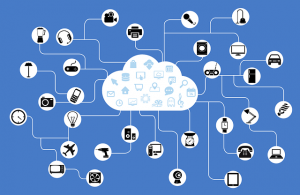 Icons of various technologies connected to a cloud, representing how the Internet of Things is revolutionizing the supply chain.